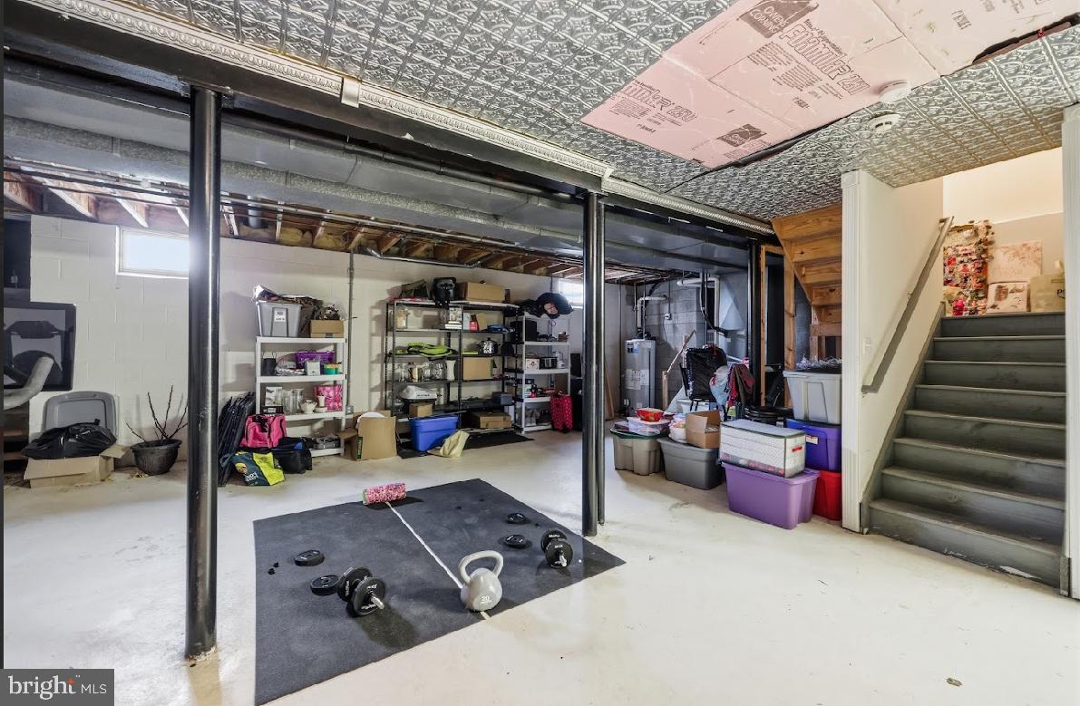 119 Basin Road Hammonton, NJ 08037 - Photo 22 of 29 a living room with lots of furniture and baby bed