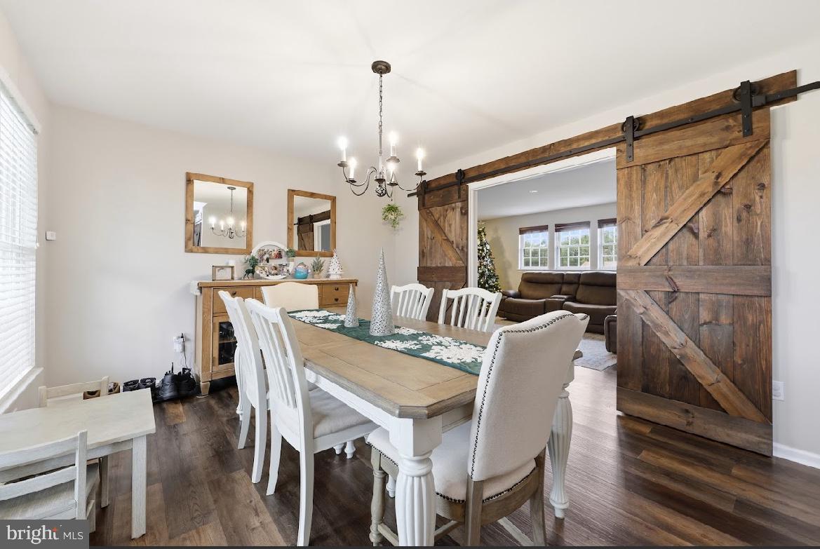 119 Basin Road Hammonton, NJ 08037 - Photo 3 of 29 a view of a dining room with furniture window and wooden floor