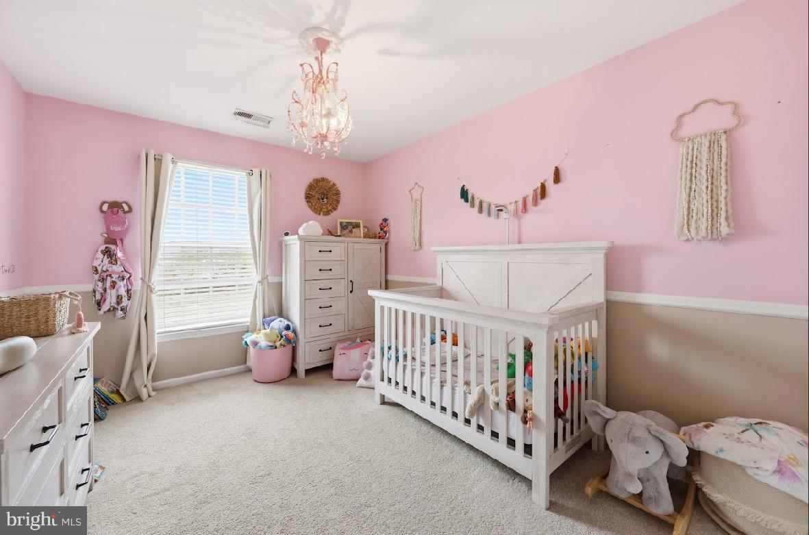 119 Basin Road Hammonton, NJ 08037 - Photo 5 of 29 a bedroom with furniture and a large window