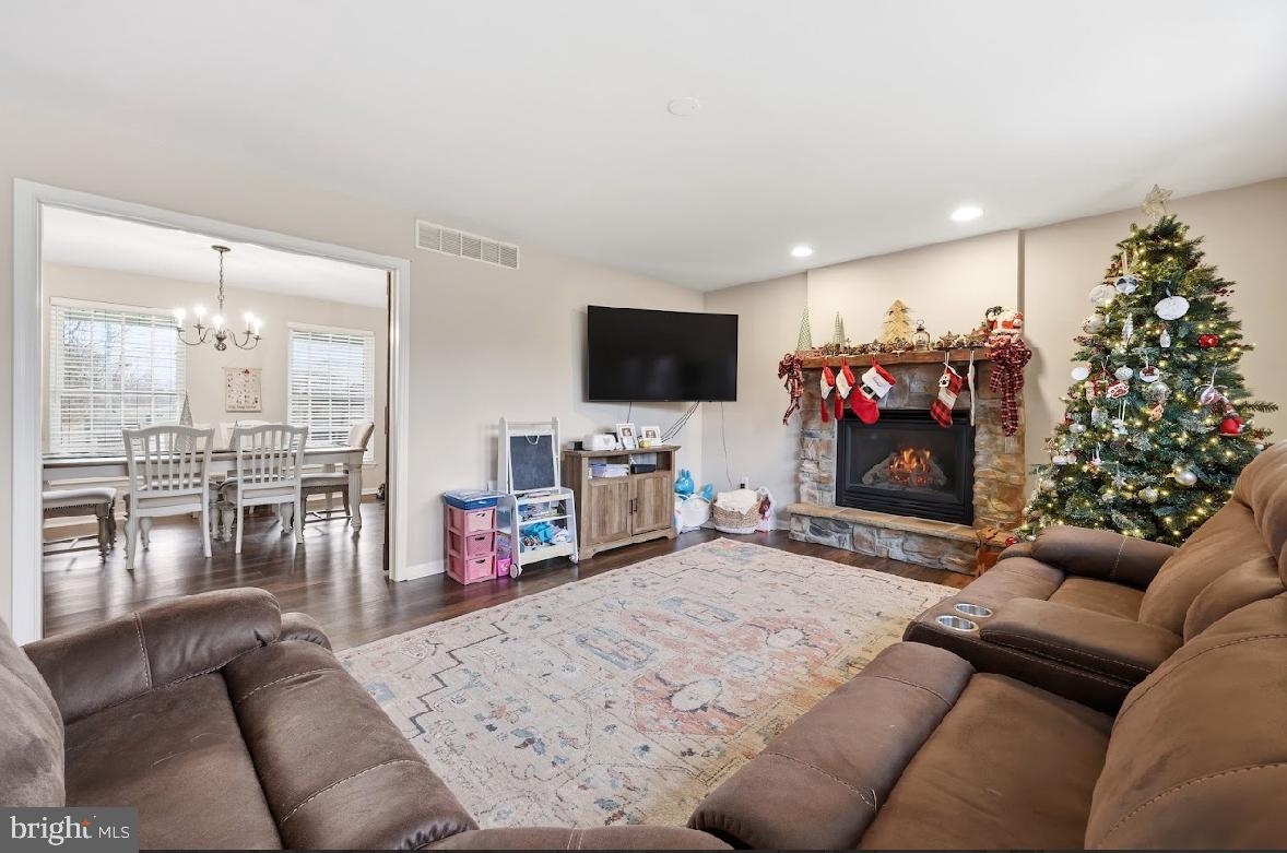 119 Basin Road Hammonton, NJ 08037 - Photo 7 of 29 a living room with furniture and a flat screen tv
