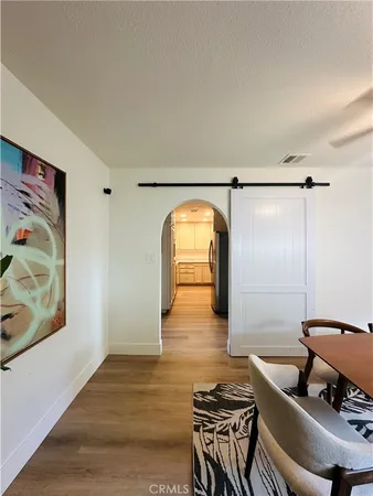a room with furniture and wooden floor