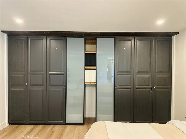 a bathroom with a shower and a sink