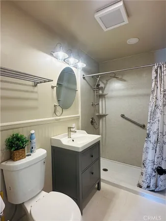 a kitchen with a sink cabinets and window