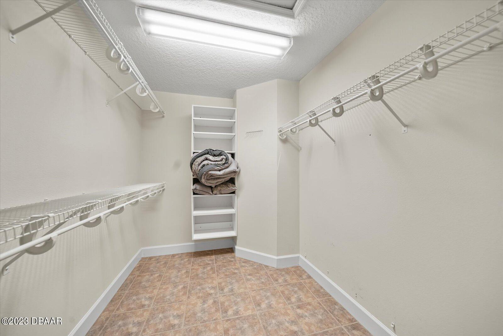 47 Coquina Ridge Way Ormond Beach, FL 32174 - Photo 26 of 51 Master bedroom walk-in closet