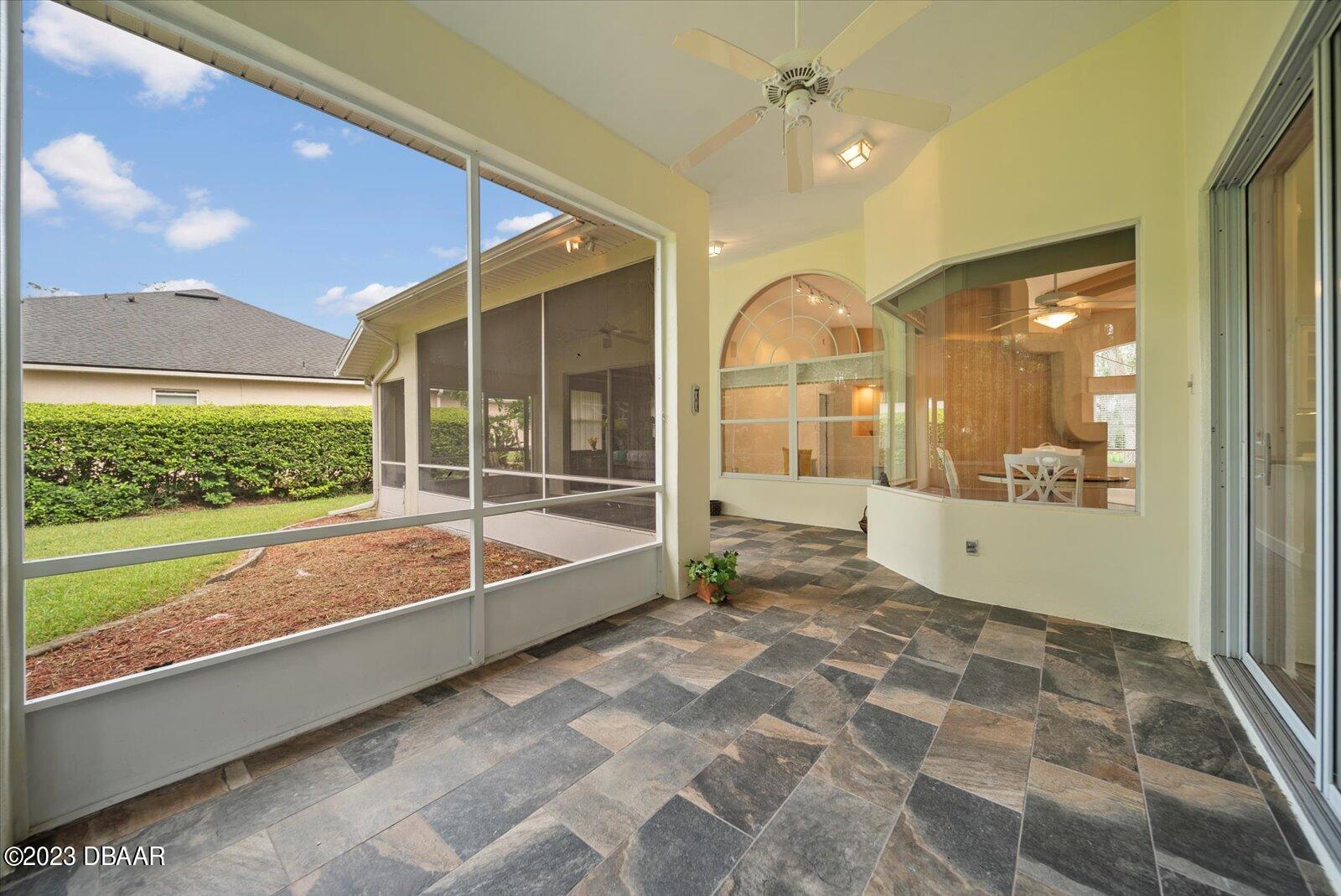 47 Coquina Ridge Way Ormond Beach, FL 32174 - Photo 35 of 51 Extra large wrap around screened lanai