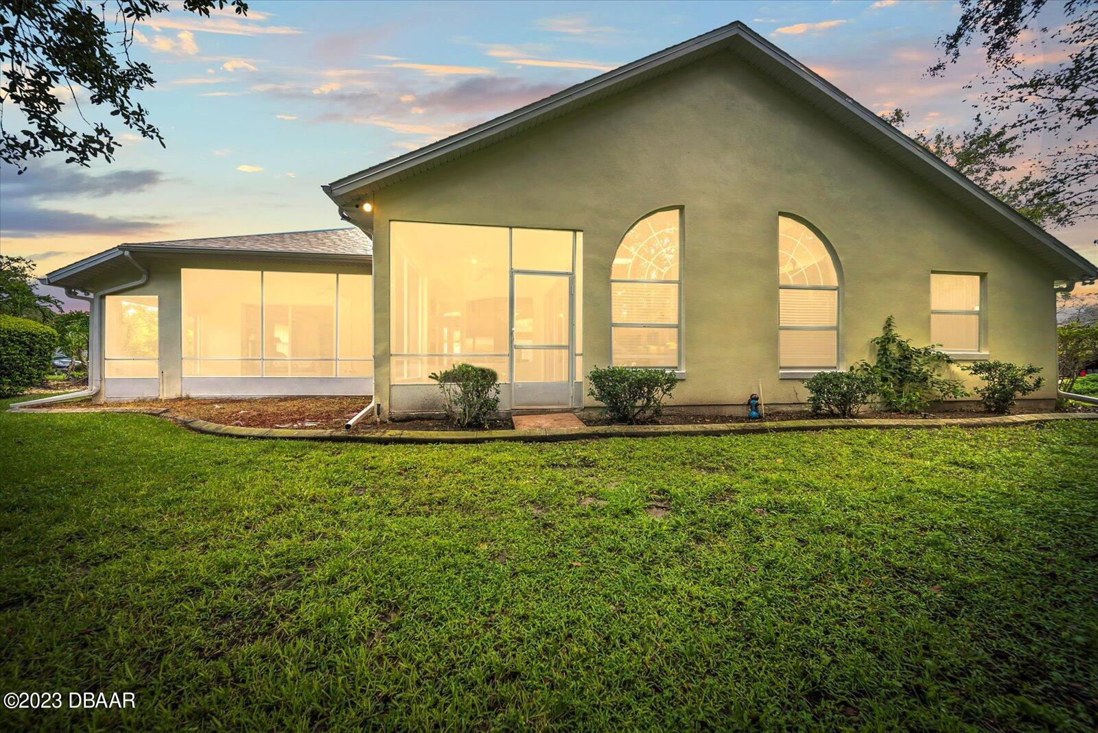 47 Coquina Ridge Way Ormond Beach, FL 32174 - Photo 42 of 51 Rear of home - twighlight