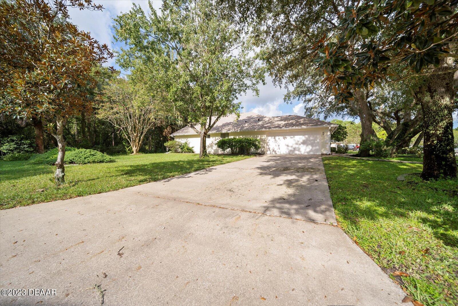 47 Coquina Ridge Way Ormond Beach, FL 32174 - Photo 44 of 51 Side of home - Garage