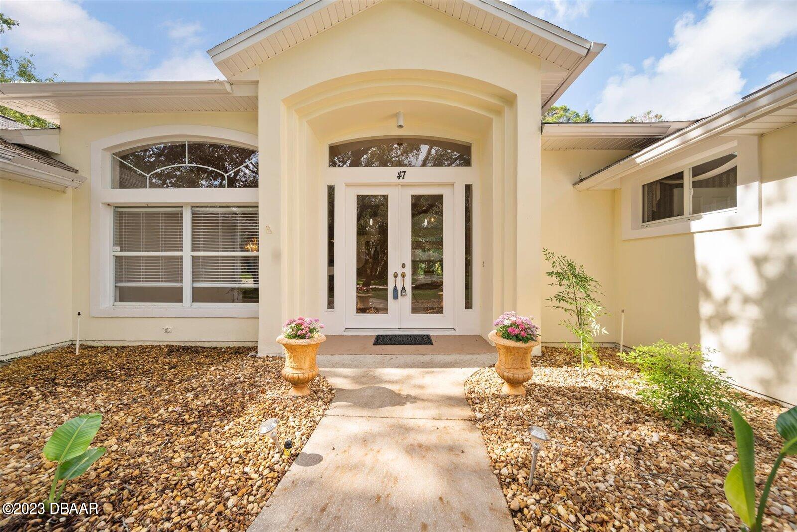 47 Coquina Ridge Way Ormond Beach, FL 32174 - Photo 6 of 51 Front door.