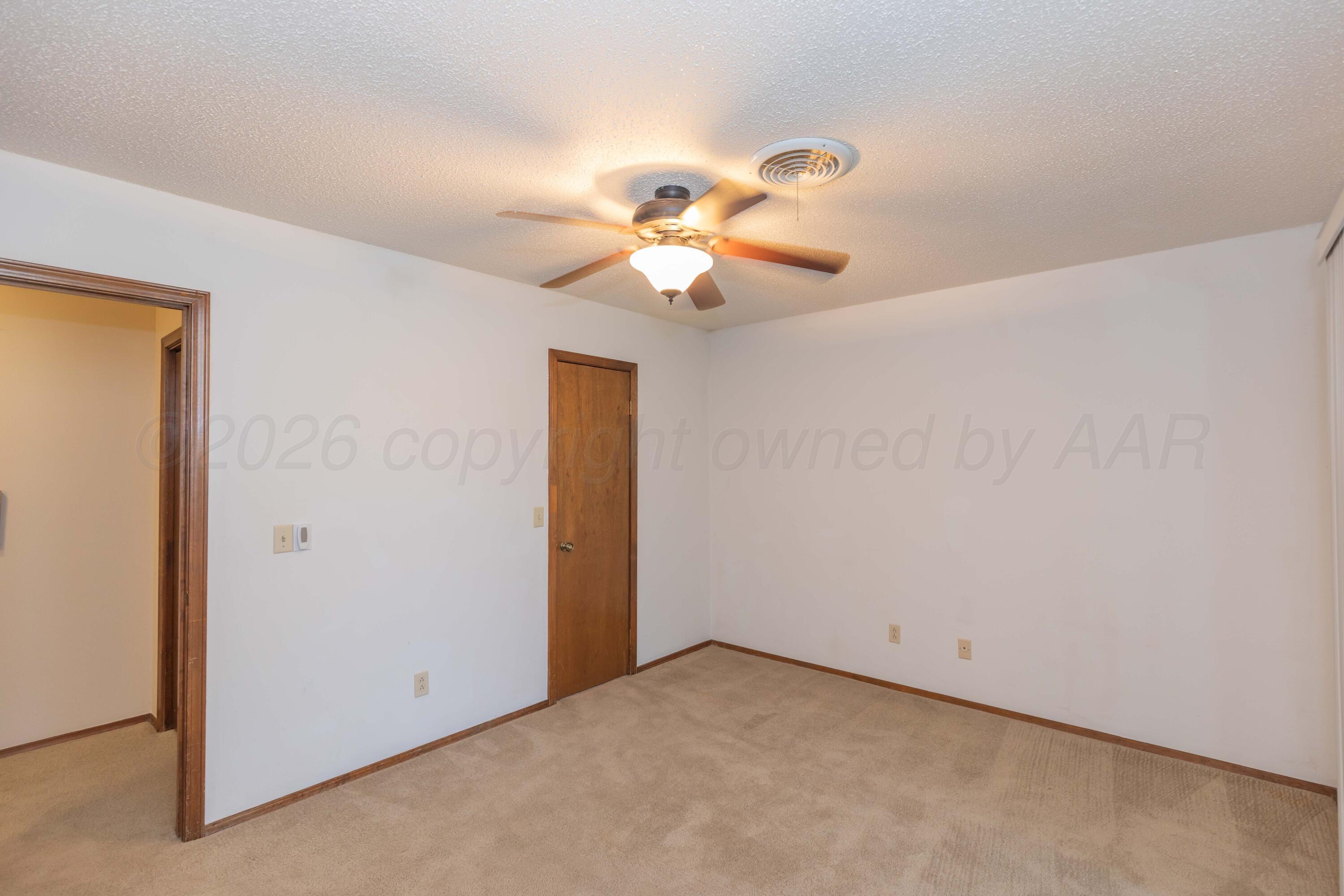 410 Creekside Drive Amarillo, TX 79124 - Photo 29 of 46 a view of a chandelier fan in a room