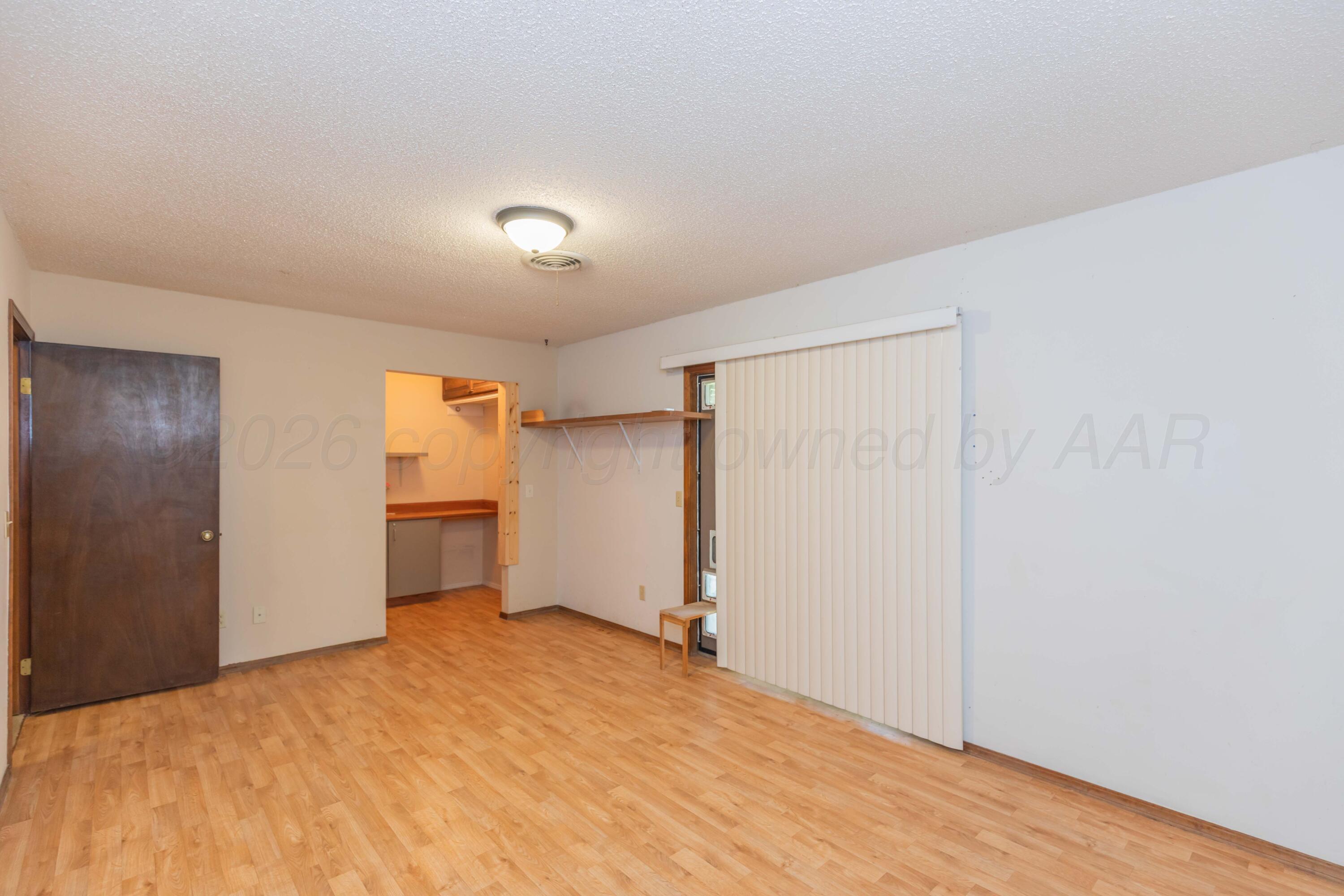 410 Creekside Drive Amarillo, TX 79124 - Photo 35 of 46 a view of empty room with a window