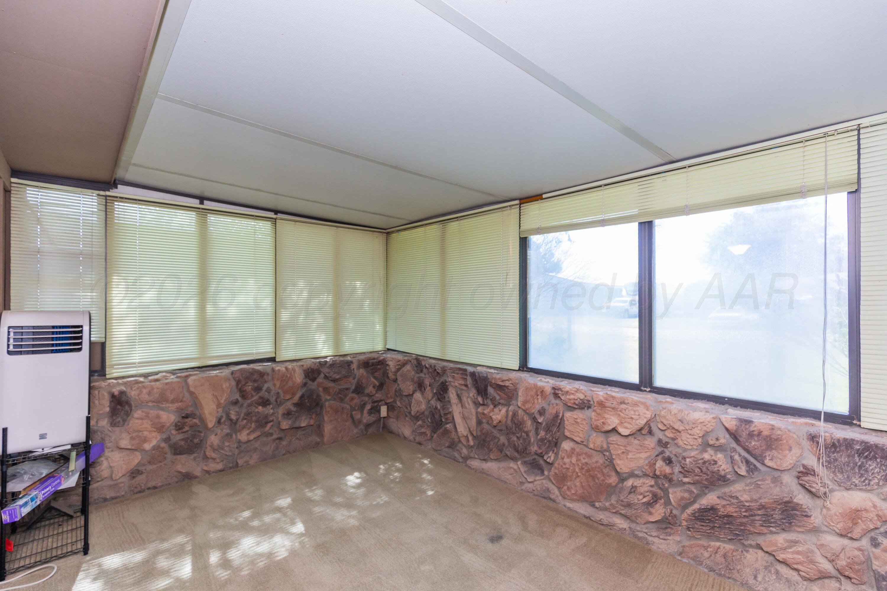 410 Creekside Drive Amarillo, TX 79124 - Photo 44 of 46 a view of an empty room with a window