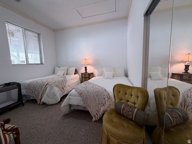 2855 South 1000 West Perry, UT 84302 - Photo 103 of 142 Carpeted bedroom featuring crown molding and attic access