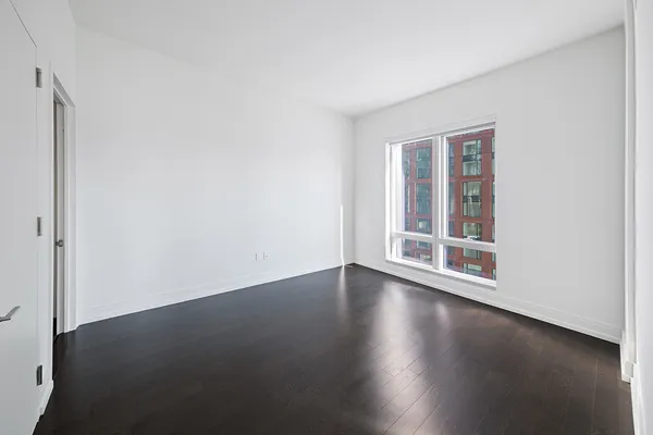 a view of a room with balcony and mountain view