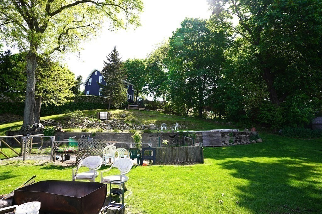 43 Alpine Place Franklin, MA 02038 - Photo 17 of 19 a view of yard with swimming pool outdoor seating and green space