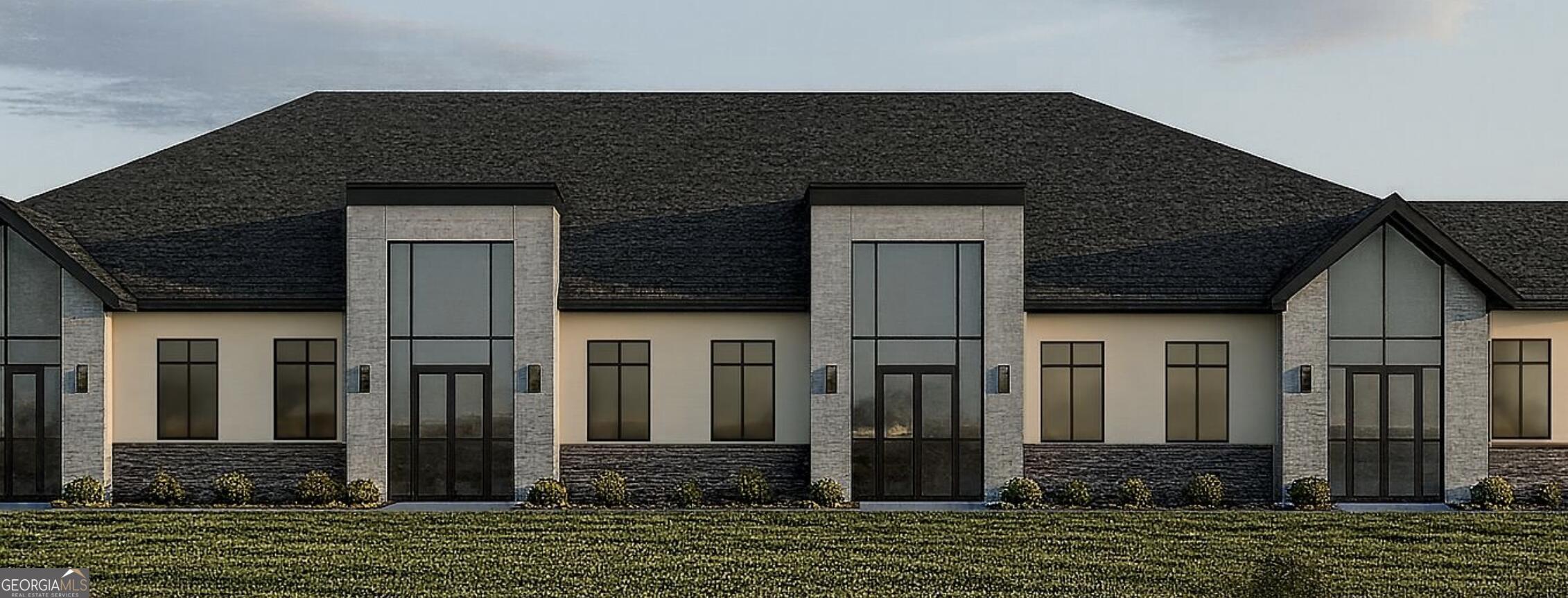 3315 Castleberry Road Cumming, GA 30040 - Photo 2 of 5 a front view of a house with a yard