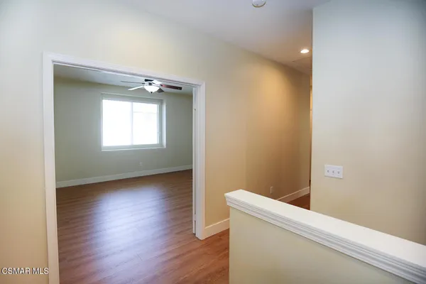 a view of livingroom with furniture and wooden floor