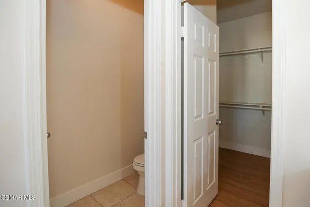a bathroom with a tub sink and shower