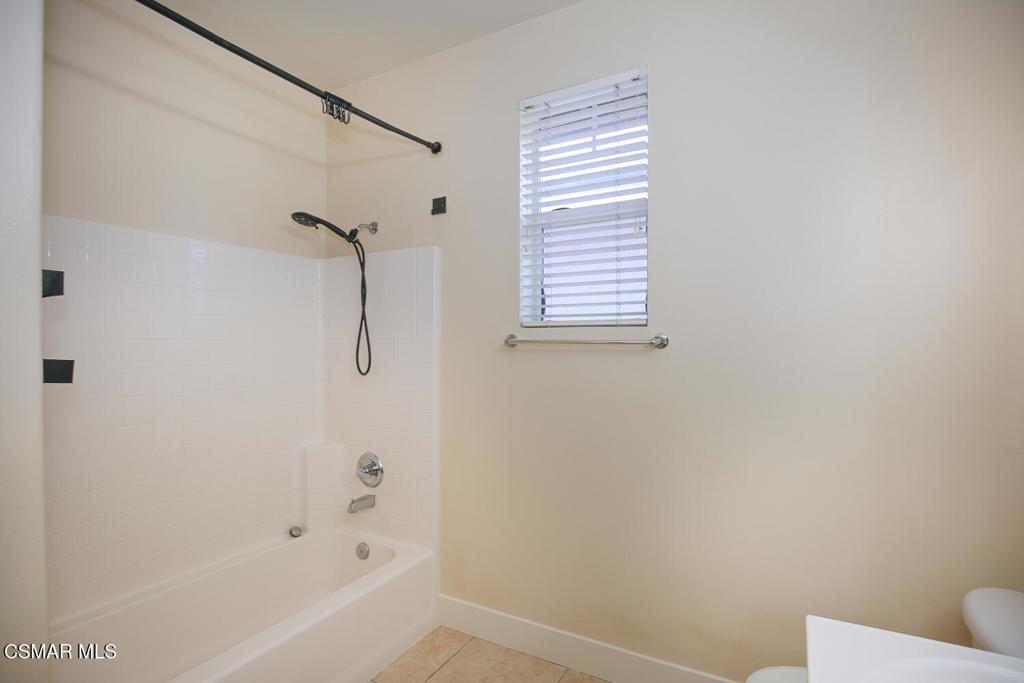 1129 Azalea Way Simi Valley, CA 93065 - Photo 40 of 49 a bathroom with a bathtub a toilet and a shower