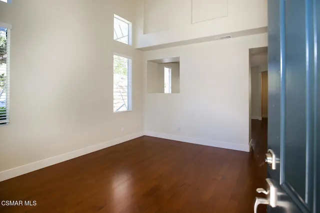 an empty room with windows