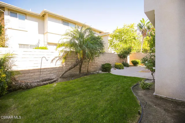 a view of a back yard of the house