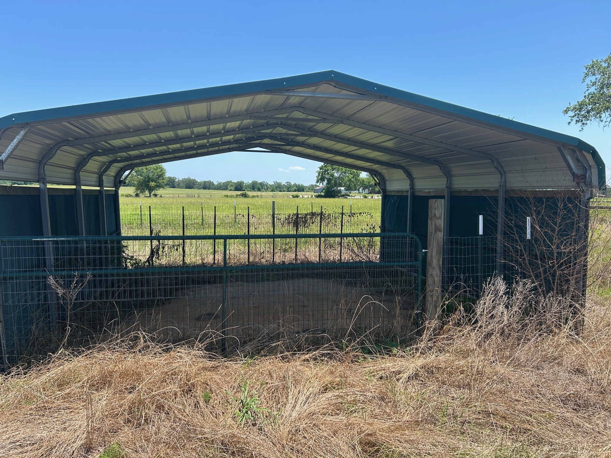 38094 Joe Loggins Road Hempstead, TX 77445 - Photo 22 of 32 a front view of a house with a yard