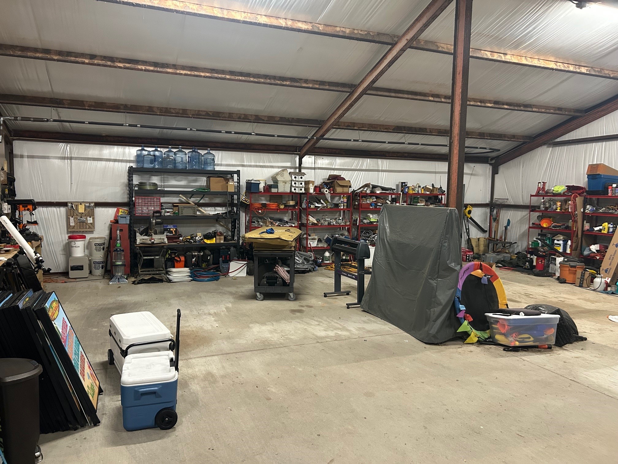 38094 Joe Loggins Road Hempstead, TX 77445 - Photo 24 of 32 a view of a garage with storage