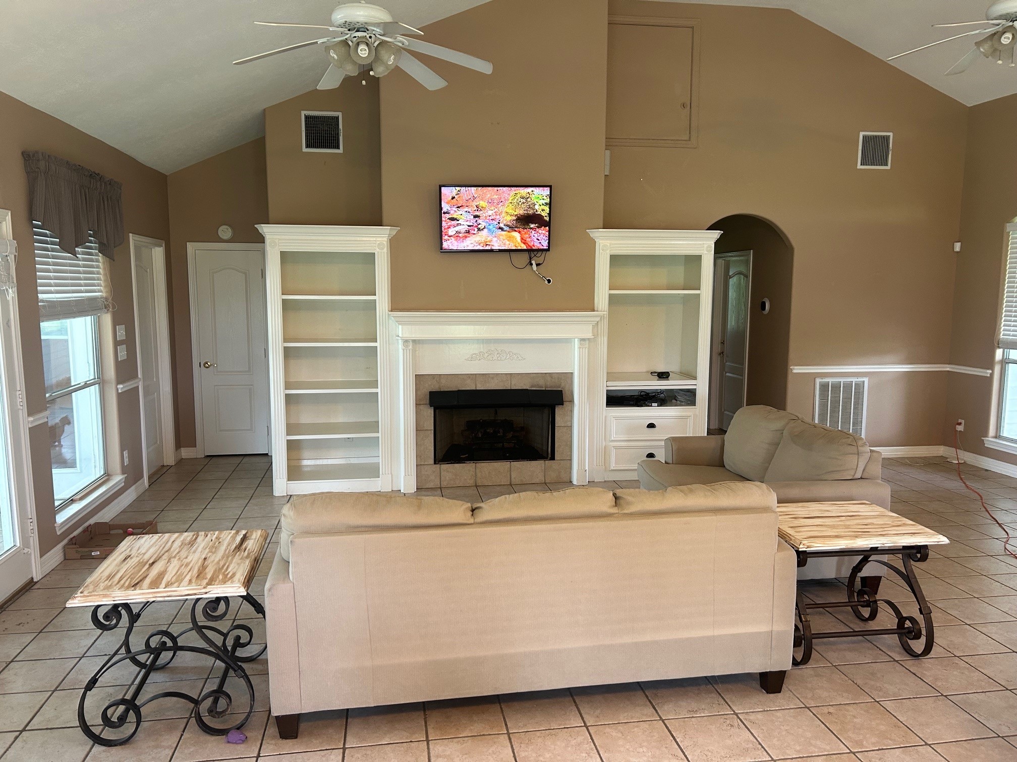 38094 Joe Loggins Road Hempstead, TX 77445 - Photo 5 of 32 a living room with furniture and a fireplace