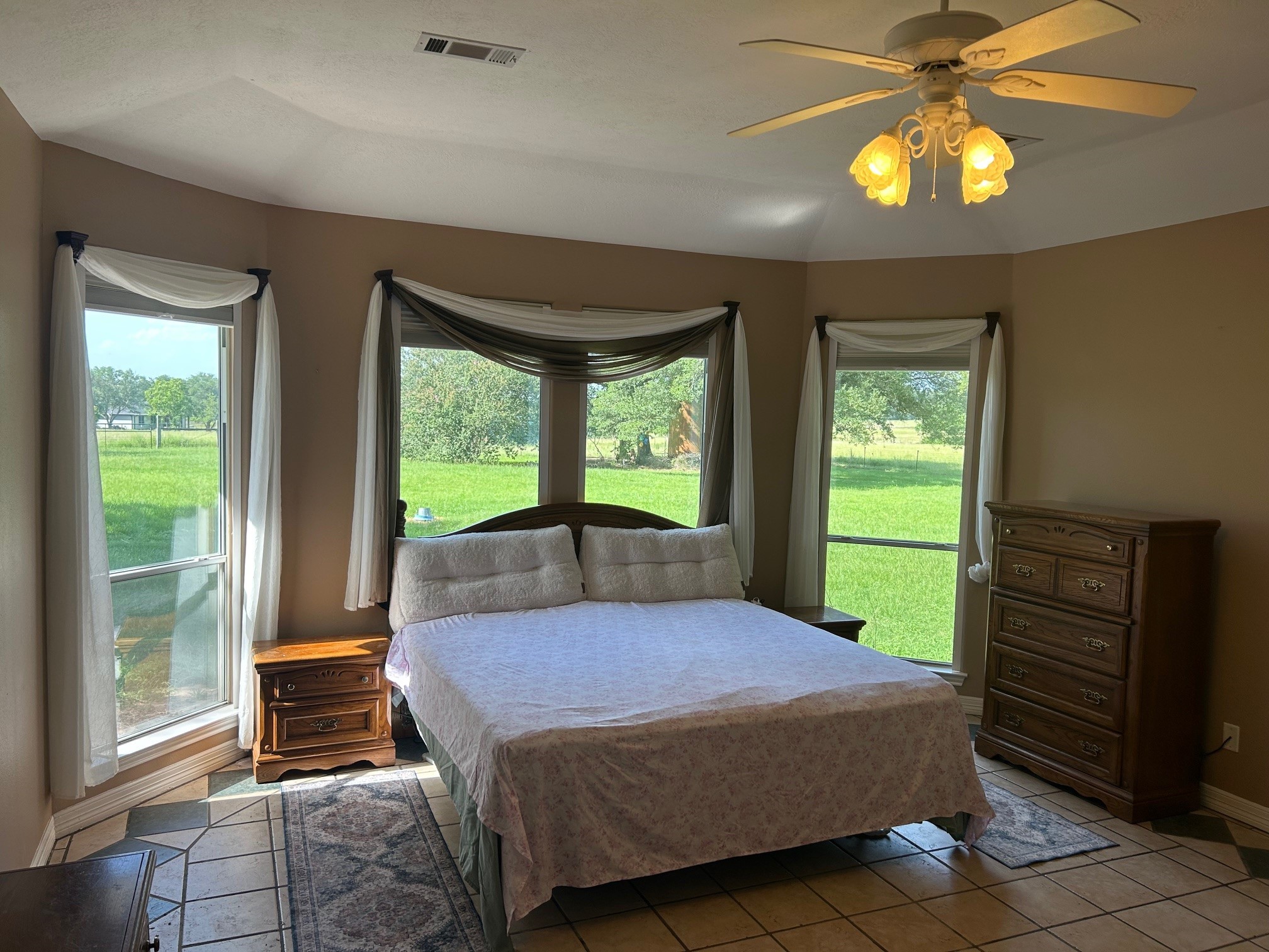 38094 Joe Loggins Road Hempstead, TX 77445 - Photo 6 of 32 a bedroom with a bed and a window