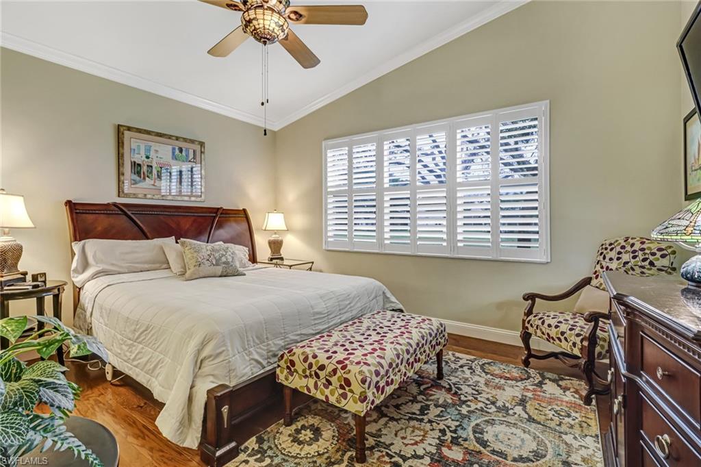 9157 Springview Loop Estero, FL 33928 - Photo 12 of 47 a bedroom with a bed and a window