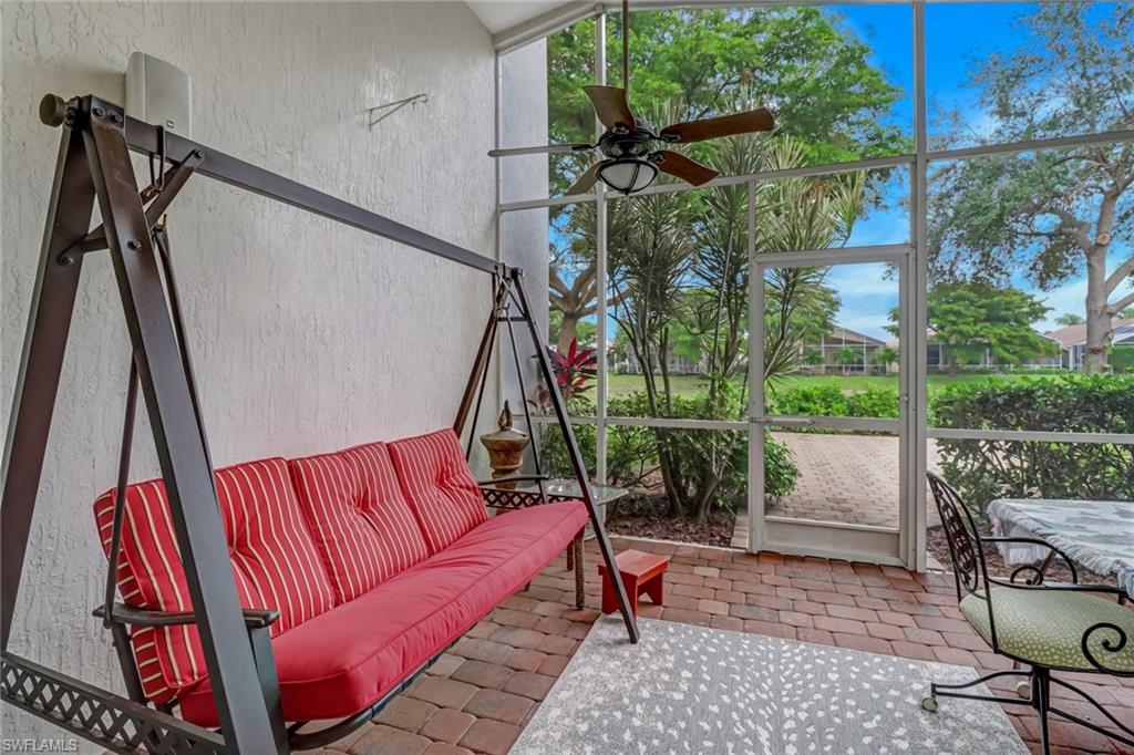 9157 Springview Loop Estero, FL 33928 - Photo 20 of 47 a sitting area with furniture and wooden deck