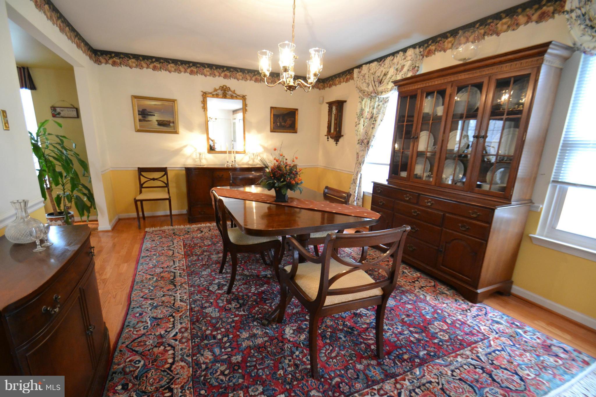 8538 Autumn Rust Road Ellicott City, MD 21043 - Photo 12 of 30 Huge DR with hardwoods and chair rail
