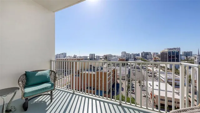 a room with furniture and a flat screen tv