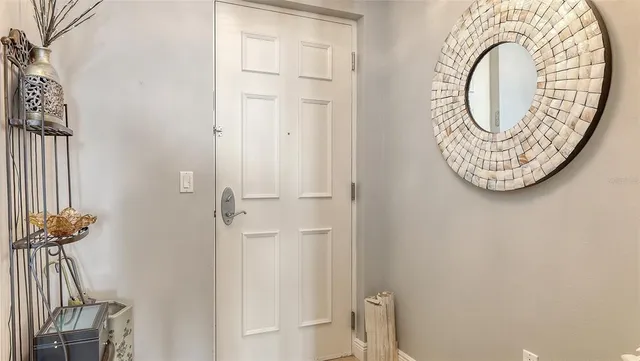 a kitchen with kitchen island granite countertop a stove and a sink