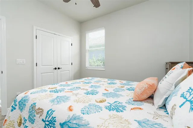 a view of a porch with furniture and garden