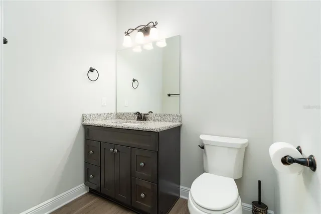 a view of an ocean with palm trees