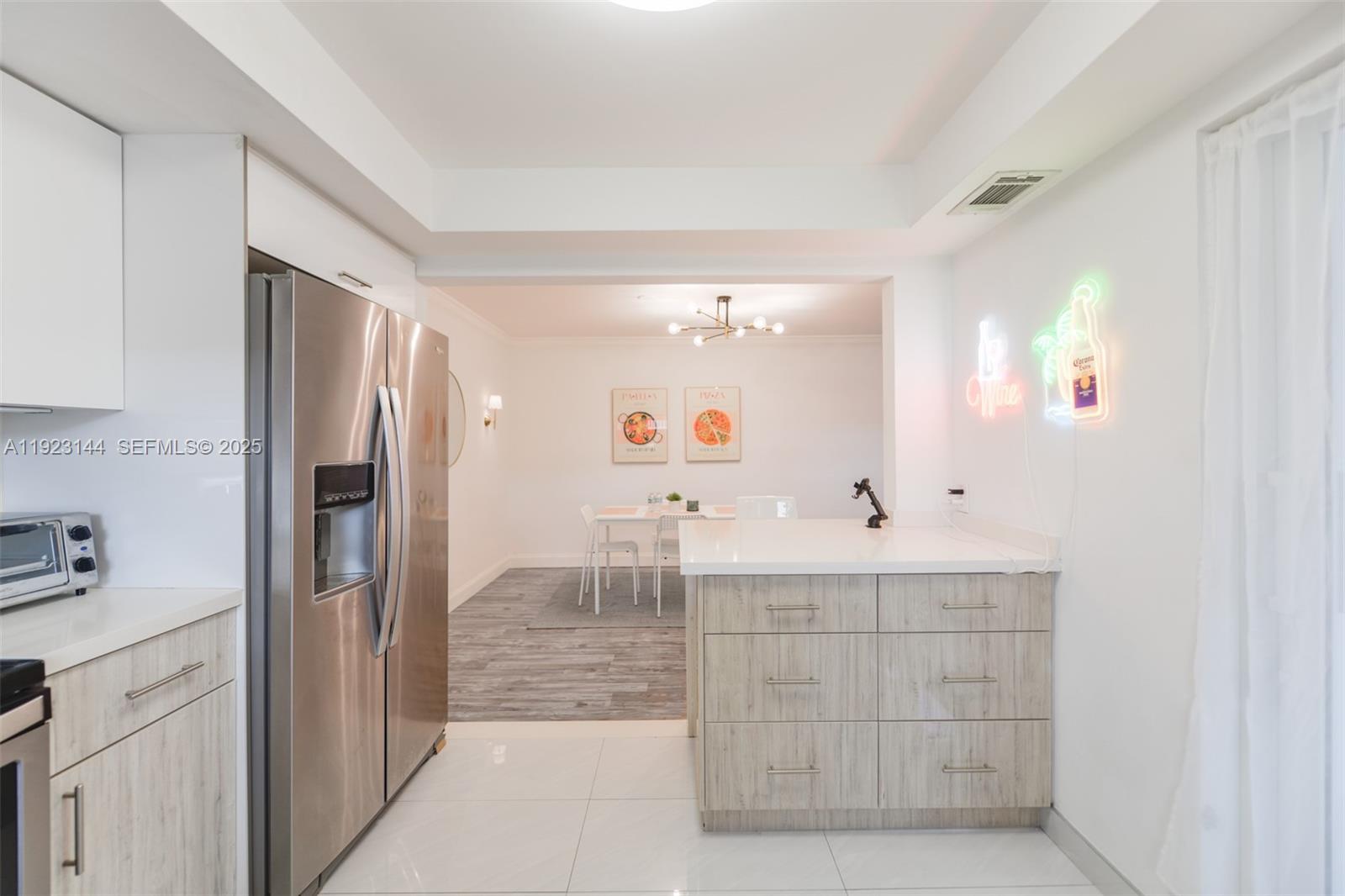 200 Northeast 12th Avenue, Unit 6D Hallandale Beach, FL 33009 - Photo 12 of 36 a bathroom with a double vanity sink mirror and shower