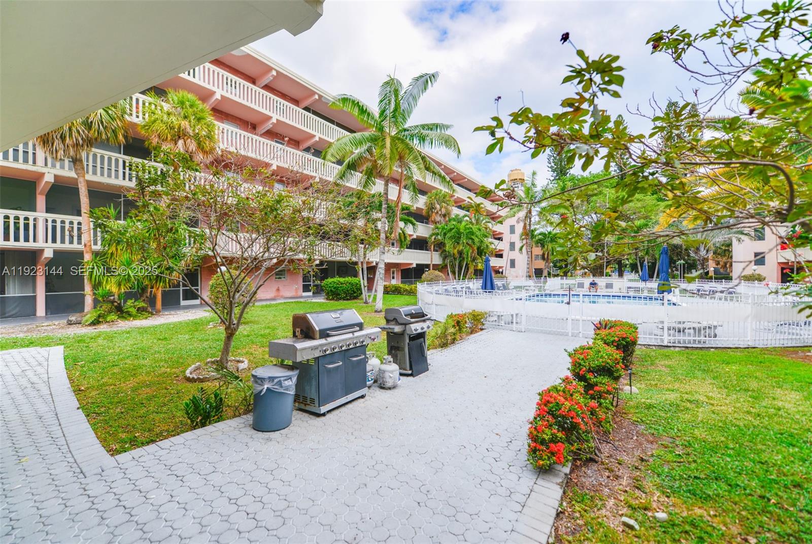 200 Northeast 12th Avenue, Unit 6D Hallandale Beach, FL 33009 - Photo 36 of 36 a view of a garden with an outdoor space
