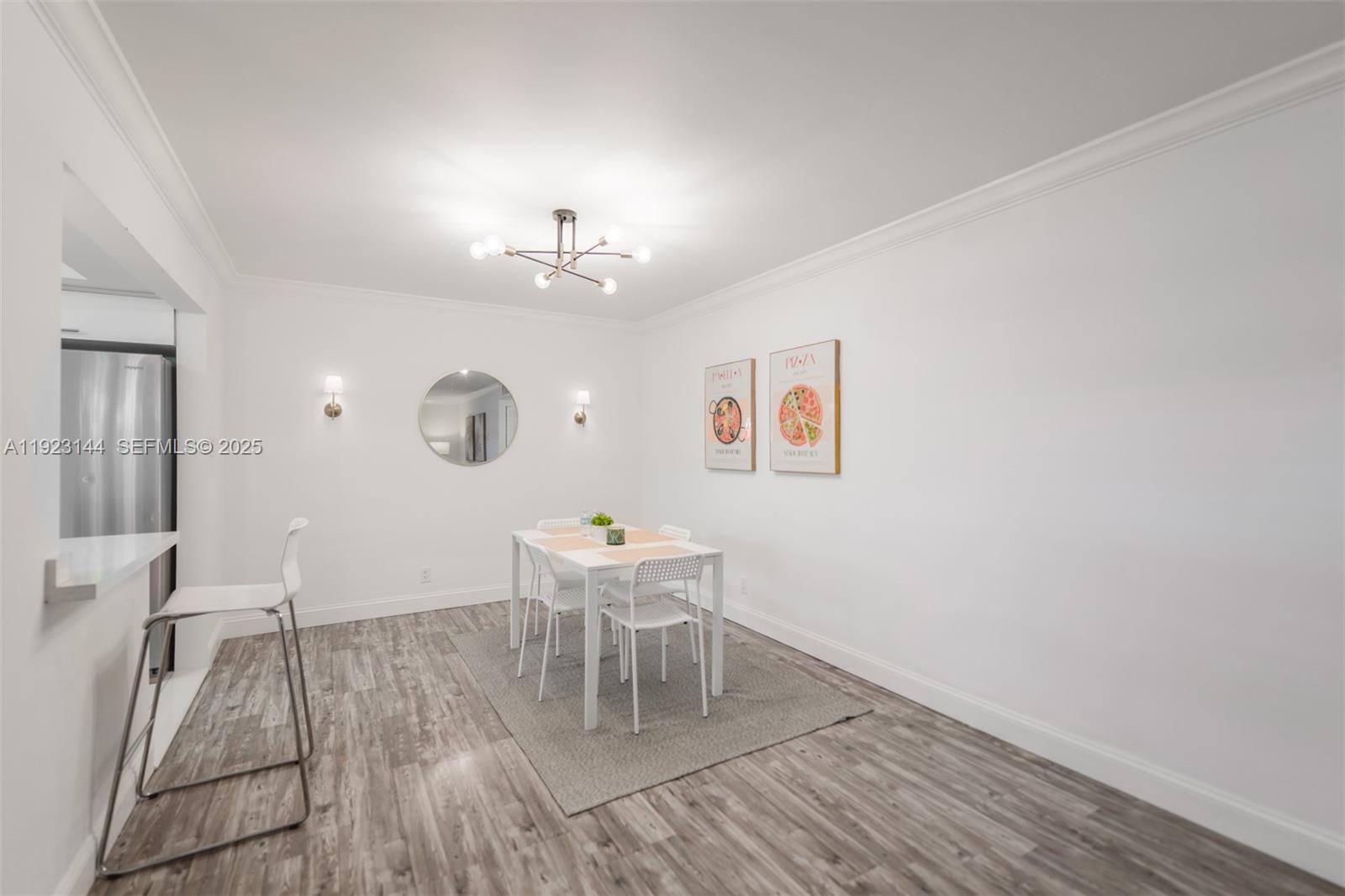 200 Northeast 12th Avenue, Unit 6D Hallandale Beach, FL 33009 - Photo 7 of 36 a view of a livingroom with furniture and wooden floor