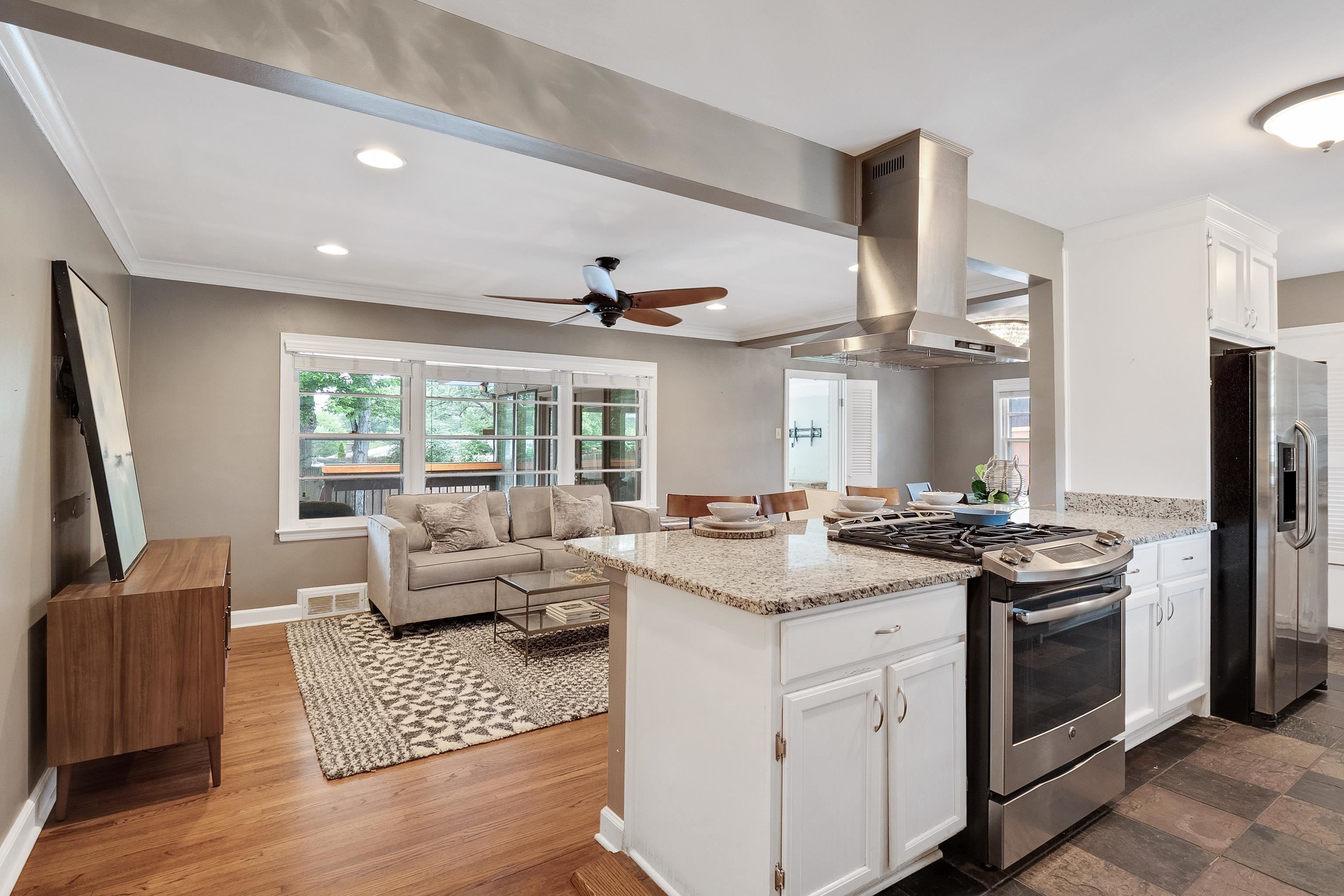 227 Wallace Road Memphis, TN 38117 - Photo 3 of 25 a view of kitchen with stainless steel appliances granite countertop a stove and a refrigerator