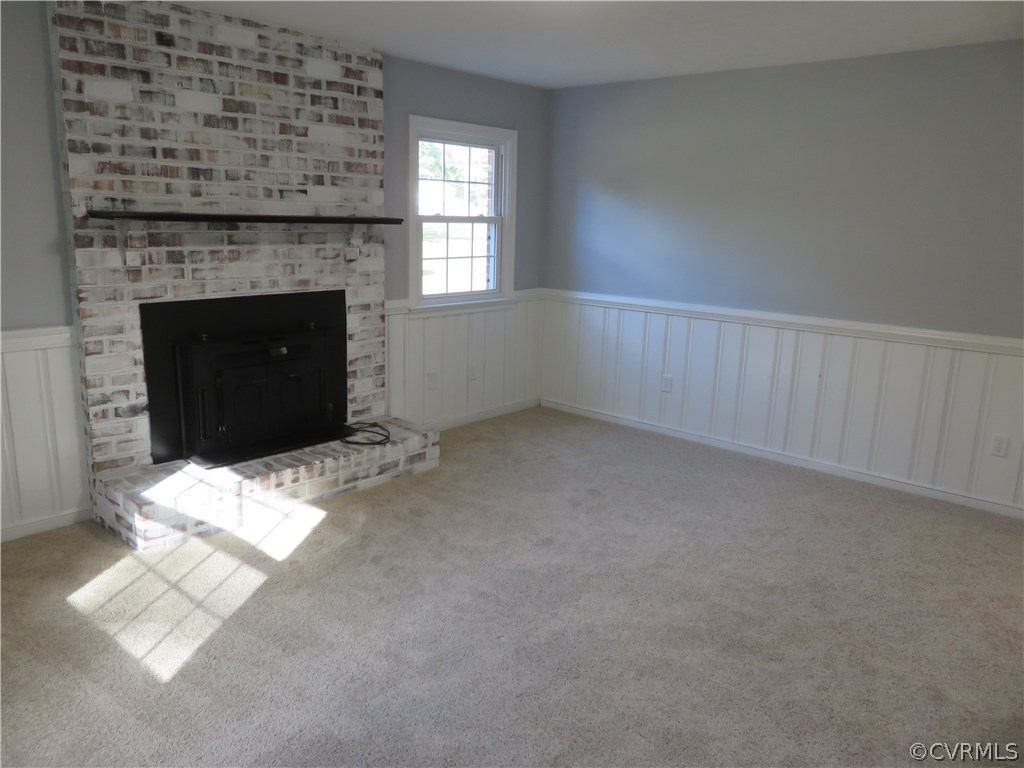 8573 Strath Road Henrico, VA 23231 - Photo 17 of 37 a view of empty room with a fireplace