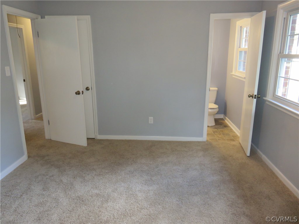 8573 Strath Road Henrico, VA 23231 - Photo 27 of 37 a view of an empty room with windows
