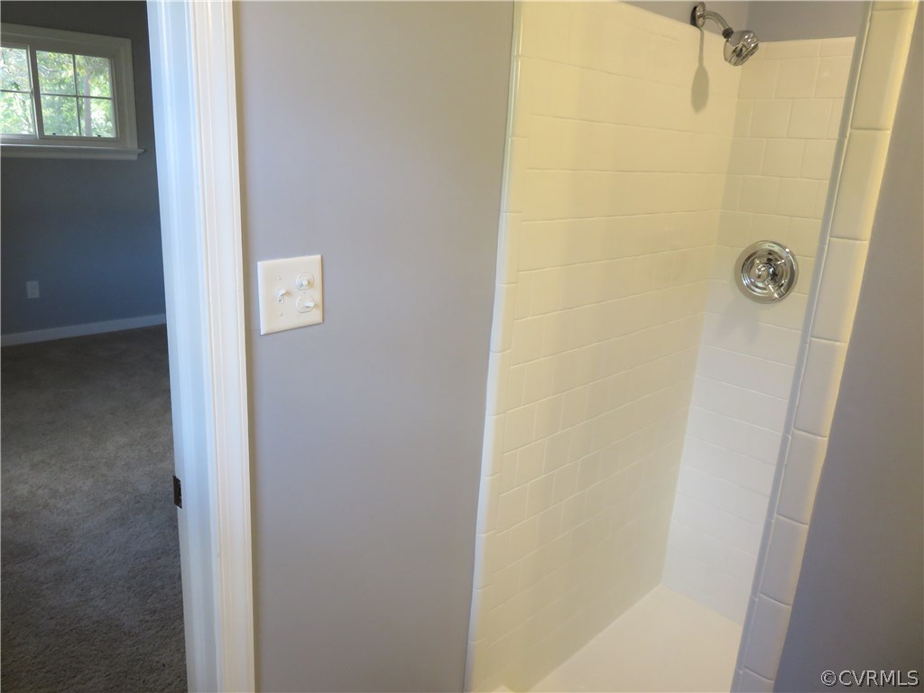 8573 Strath Road Henrico, VA 23231 - Photo 30 of 37 a bathroom with a shower