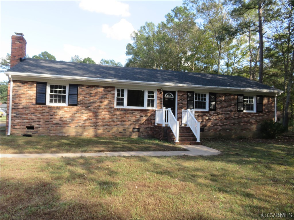 8573 Strath Road Henrico, VA 23231 - Photo 3 of 37 a view of a yard in front of house