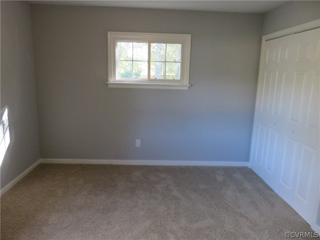 8573 Strath Road Henrico, VA 23231 - Photo 31 of 37 an empty room with a window