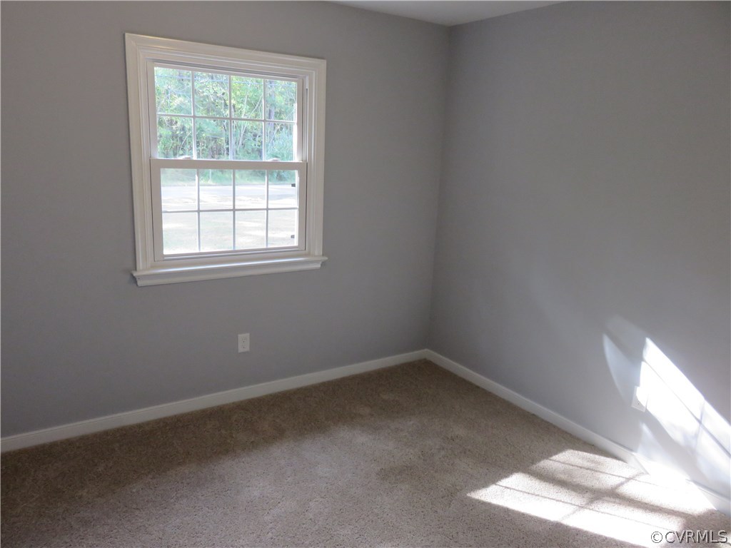 8573 Strath Road Henrico, VA 23231 - Photo 34 of 37 an empty room with a window