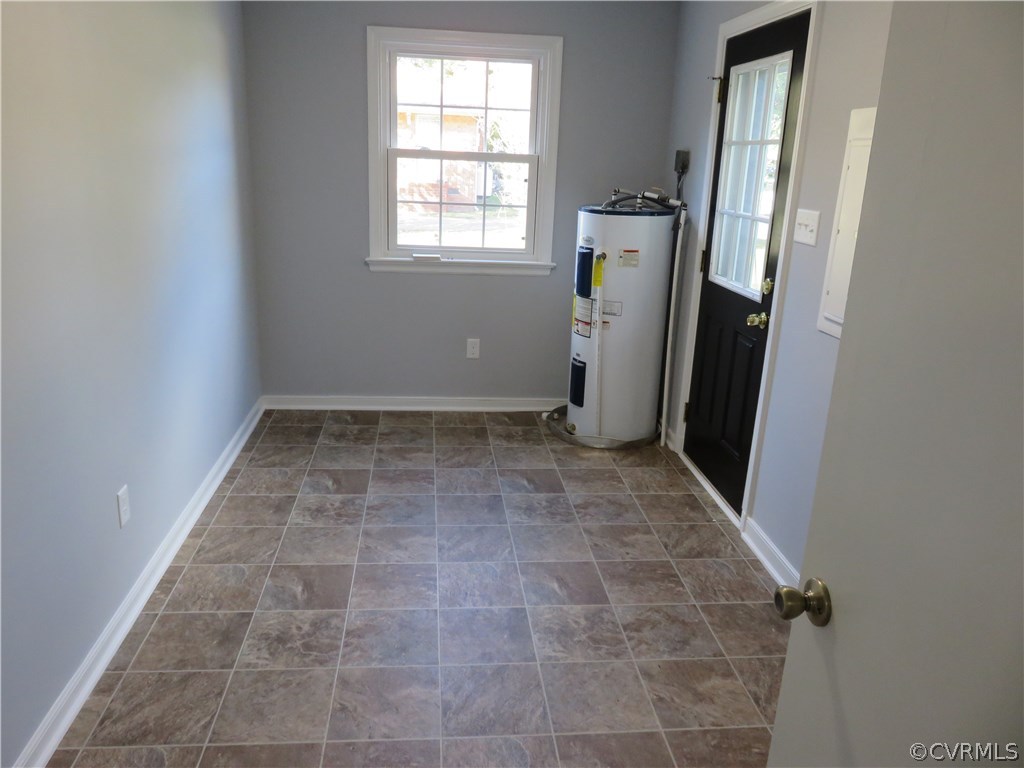 8573 Strath Road Henrico, VA 23231 - Photo 36 of 37 an empty room with windows