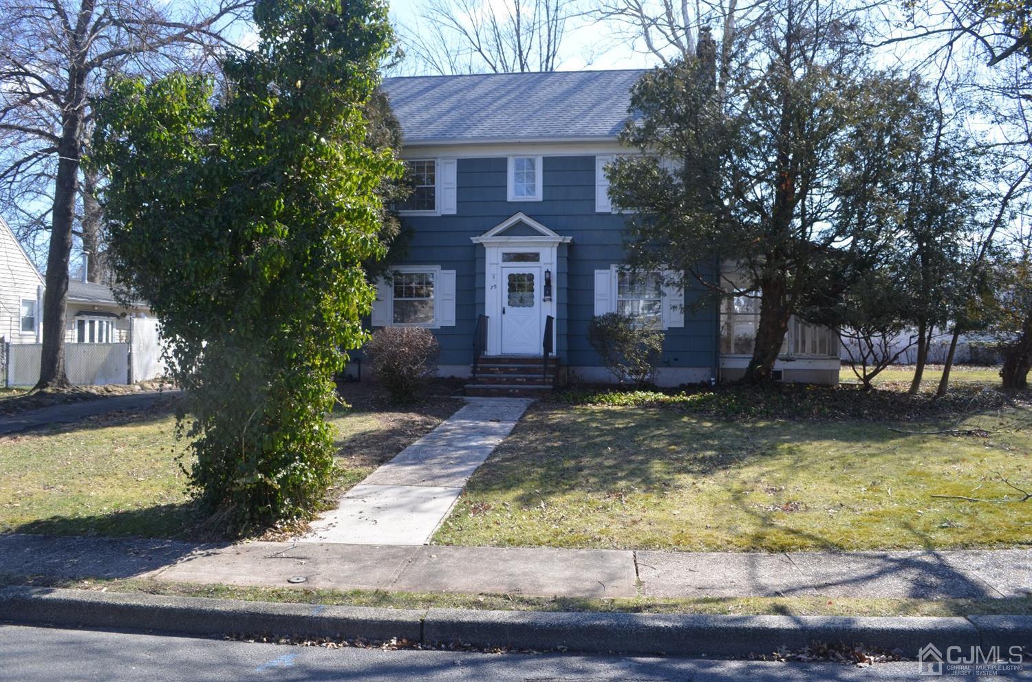 75 West Hill Road Colonia, NJ 07067 - Photo 3 of 35 a front view of a house with garden