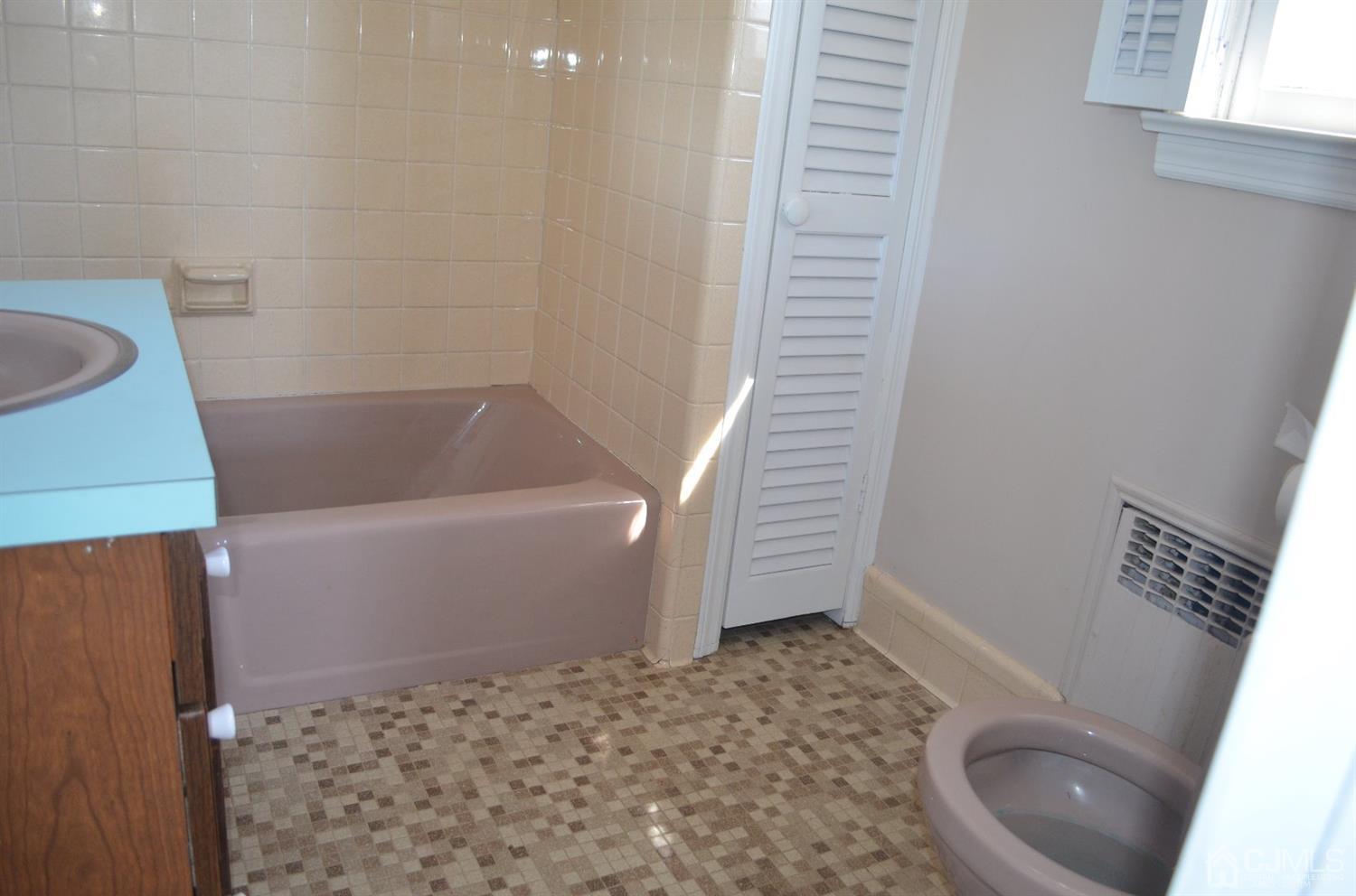 75 West Hill Road Colonia, NJ 07067 - Photo 28 of 35 a bathroom with a sink and toilet