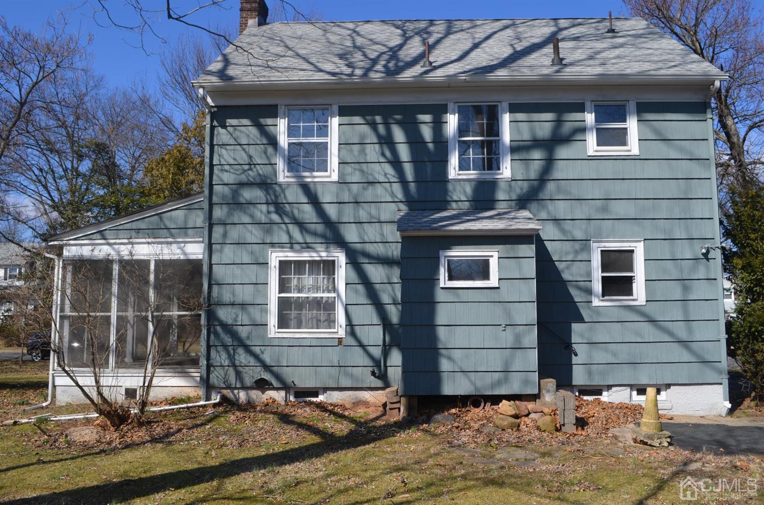 75 West Hill Road Colonia, NJ 07067 - Photo 4 of 35 a front view of a house with garden