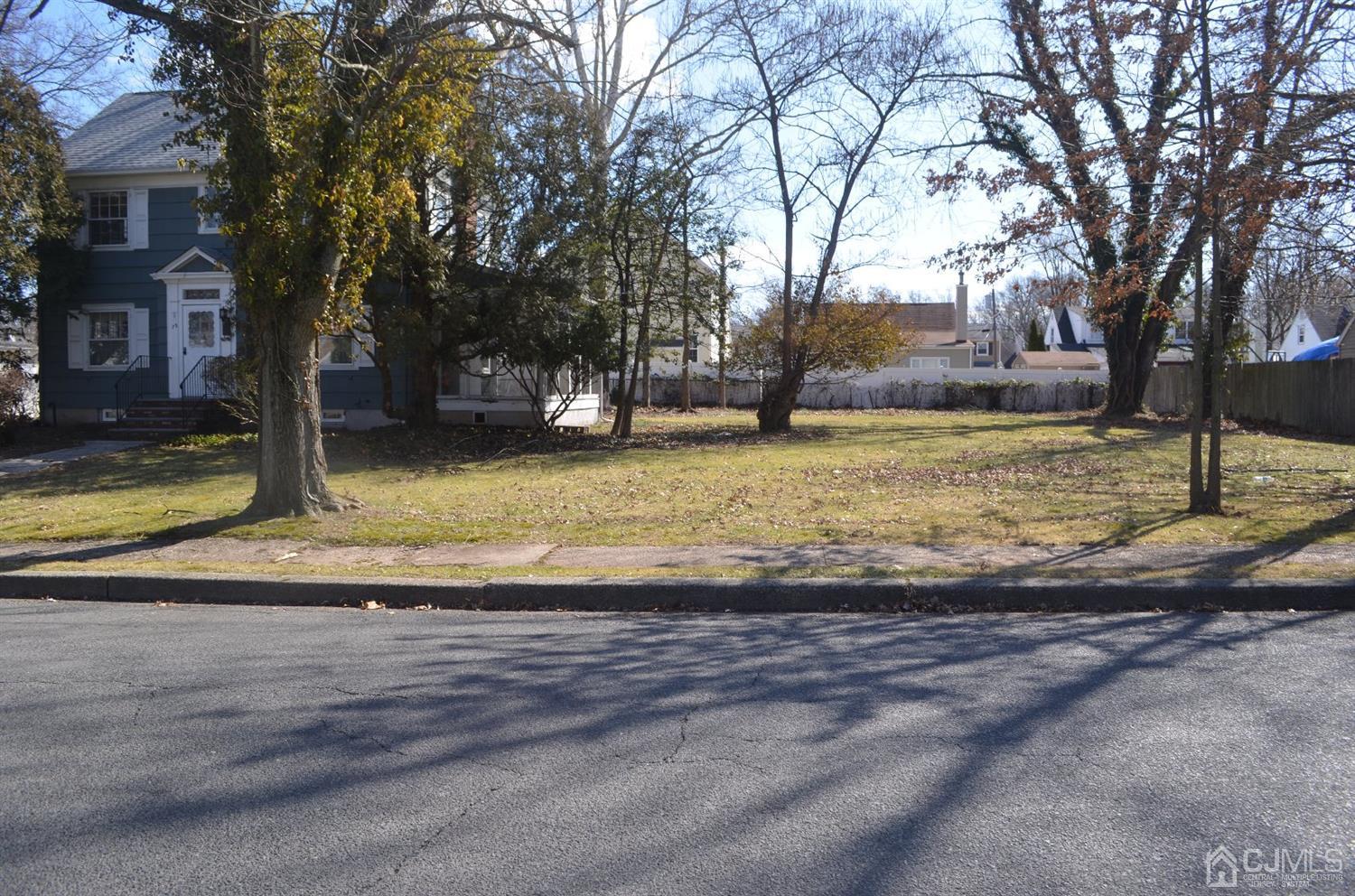 75 West Hill Road Colonia, NJ 07067 - Photo 7 of 35 a view of a yard with a house